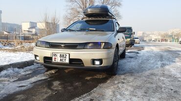 хода акот: Mazda 323: 1997 г., 1.5 л, Механика, Бензин, Седан