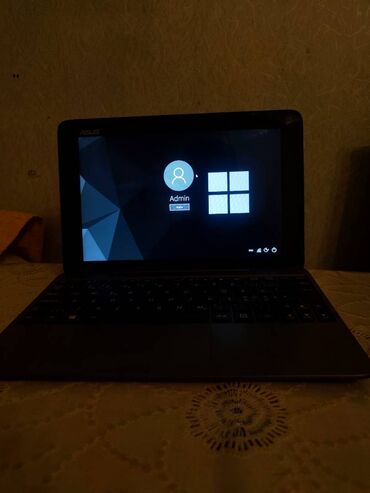 asus x550: Intel Atom, 2 GB, 11.6 "