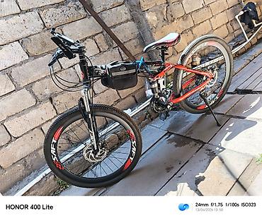 İdman velosipedləri: Cox surulmeyib istifade olunmadigi ucun satilir .Dağ/şosse hibrid — 1