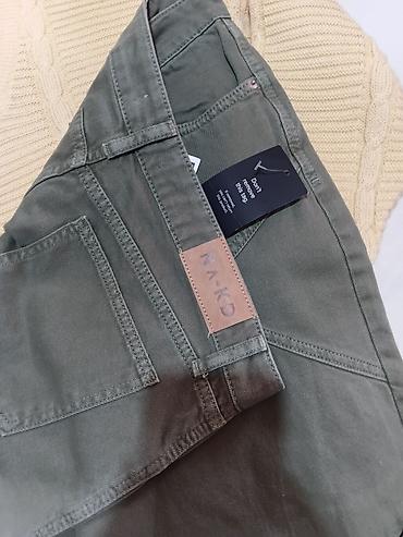 Ostale pantalone: NA-KD ženske pantalone – model: Panel Denim/Utility Style - Brend — 8