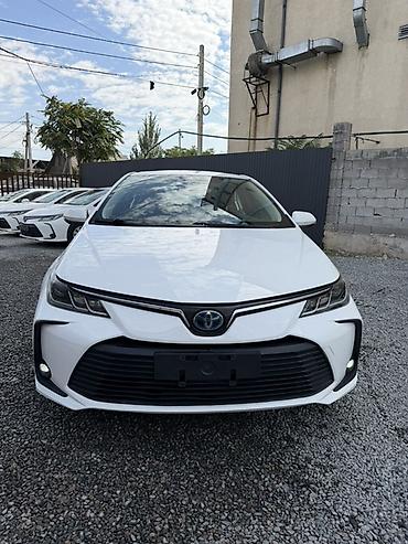 corolla 2004: Toyota Corolla: 2022 г., 1.8 л, Гибрид, Седан — 2