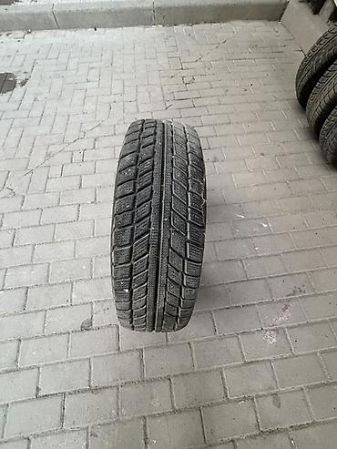 е 210: Комплект из 4 автомобильных шин. - Тип: зимние (симметричный — 4