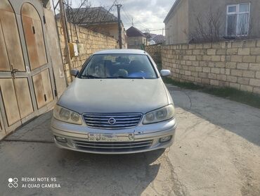 Nissan: Nissan Sunny: 1.3 l | 2006 il Sedan