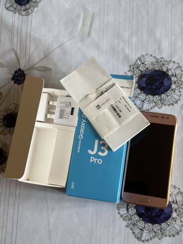 naxcivan telefon magazalari: Samsung Galaxy J3 2017, 16 GB, rəng - Çəhrayı, Düyməli, Sensor, İki sim kartlı