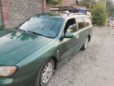 айнек машина: Nissan Primera: 1999 г., 2 л, Механика, Бензин, Универсал