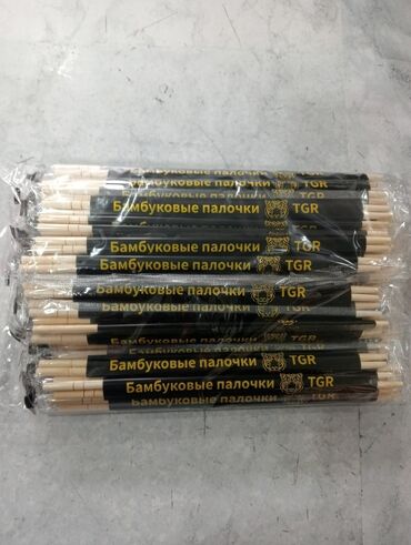 разборка кухонной мебели: Упаковка бамбуковых палочек для суши TGR. Каждая пара палочек обернута