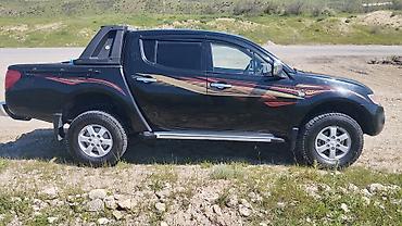 sukanlar: Mitsubishi Pikap: 2.4 l | 2012 il 308377 km Pikap — 9