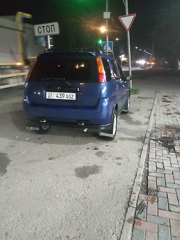 Другие автомобили: Компактный кроссовер/универсал синего цвета. Основные особенности: - — 3
