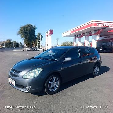 бампе: Toyota Matrix: 2003 г., 2 л, Автомат, Бензин, Хэтчбэк — 4