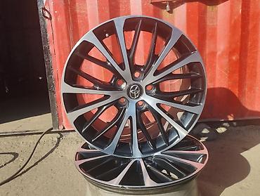 Диски: Литые диски Toyota, комплект из 4 шт. - Диаметр: 18" - Разболтовка — 1