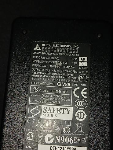 Модемы и сетевое оборудование: Блок питания Delta Electronics Genuine EADP-18CB AC Adapter 100-240VAC — 2