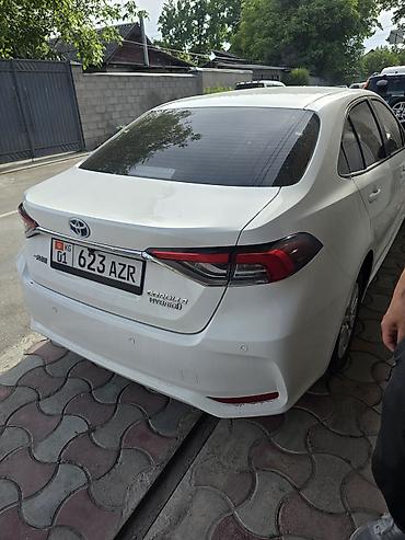 corolla 2022: Toyota Corolla: 2022 г., 1.8 л, Вариатор, Гибрид, Седан — 7