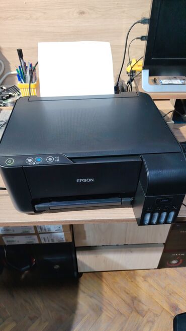 Skanerlər: Epson markalı, qara rəngdə mürəkkəb tanklı printer, yüksək həcmli çap