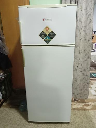 Swizer iki qapılı soyuducu - Üst hissədə dondurucu bölmə, aşağıda