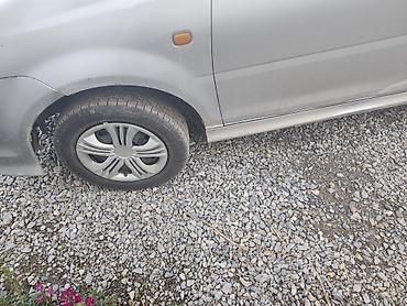 Daihatsu YRV: 2001 г., 1.3 л, Механика, Бензин, Хэтчбэк