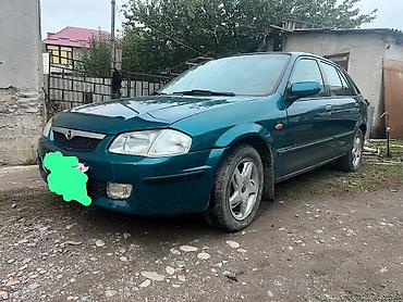 Haima: Mazda Familia: 1999 г., 1.5 л, Автомат, Бензин, Хэтчбэк — 1