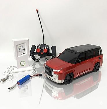 Игрушки: Радиоуправляемый автомобиль (масштаб примерно 1:16–1:18), стильный — 1