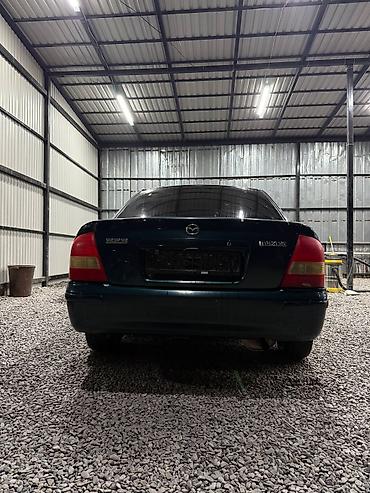 мини электро: Mazda 323: 2000 г., 1.3 л, Механика, Бензин, Седан — 4