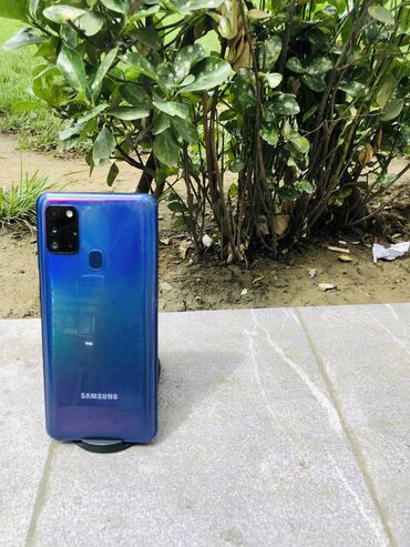 samsung 9500: Samsung Galaxy A21S, 32 ГБ, цвет - Голубой, Кнопочный, Отпечаток пальца, Face ID