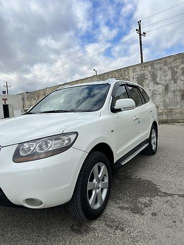 kia rio sukan: Hyundai Santa Fe: 2 l | 2009 il Krossover — 2