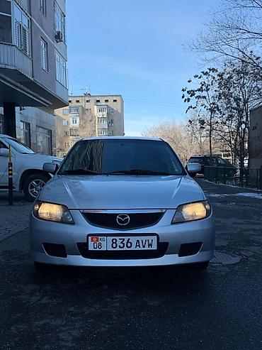 Mazda: Mazda 323: 2003 г., 1.6 л, Автомат, Бензин, Хэтчбэк — 1