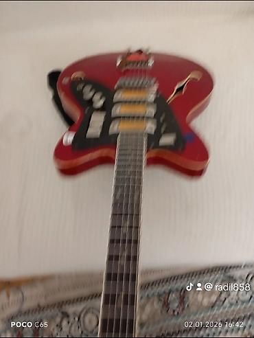 Elektro gitaralar: Elektron gitara, 6 sim, İşlənmiş, Ünvandan götürmə — 14