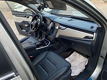 Другие автомобили: Электромобиль (седан) с современным интерьером и панорамной крышей — 5