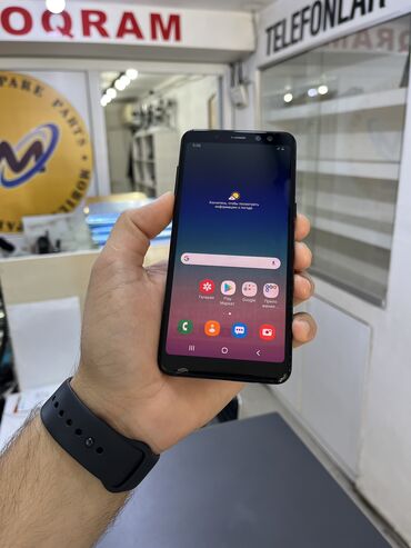 telefon tutacagı: Samsung Galaxy A8 2018, 32 ГБ, цвет - Черный, Две SIM карты
