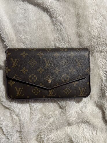 louis vuitton naocare muske: Elegantna torbica, Louis Vuitton, Materijal: Koža