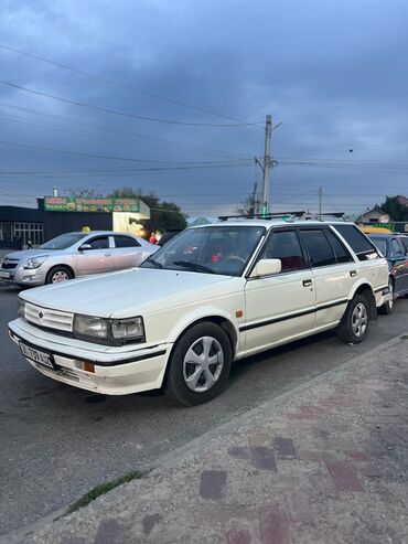 фосфаген поло: Nissan Bluebird: 1990 г., 2 л, Механика, Бензин, Универсал