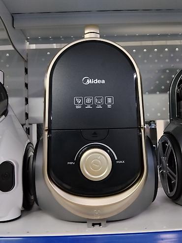 Пылесос Midea с циклонной системой - Тип: контейнерный (циклонная