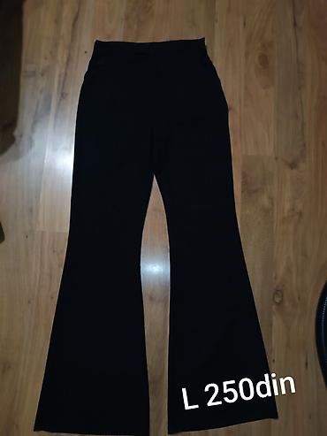 svecane ravne cipele: Crne ženske pantalone sa zvonastim nogavicama. - Veličina: L (oznaka — 2