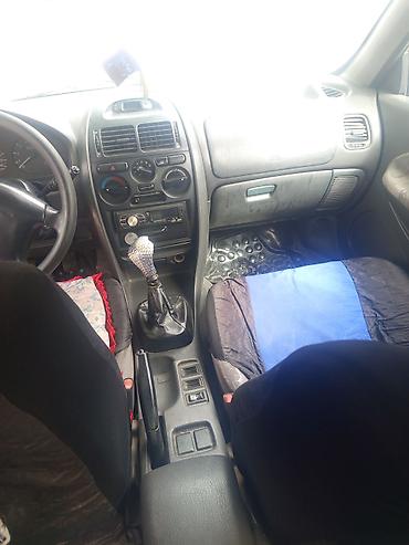 byd e2 2024: Mitsubishi Carisma: 2003 г., 1.8 л, Механика, Бензин, Седан — 7