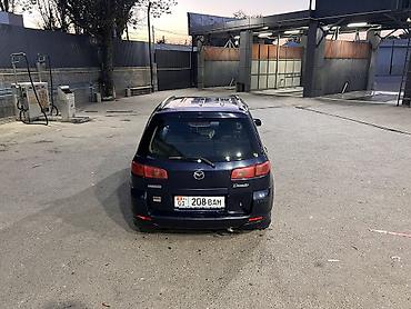 Mazda: Mazda Demio: 2003 г., 1.4 л, Робот, Бензин — 5