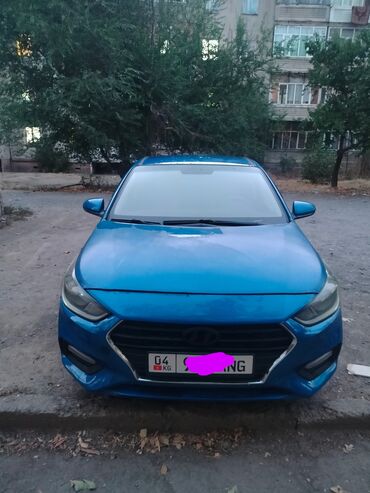 хендай солярис 2019: Автомобиль Hyundai Solaris синего цвета, представленный в кузове