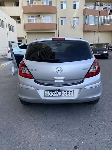 Opel: Opel Corsa CDTI, gümüşü rəng, 5 qapılı hetçbek. Texniki — 2