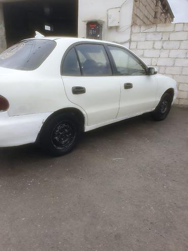 tap az kondisioner: Hyundai Accent: 1.5 l | 1995 il Sedan — 6