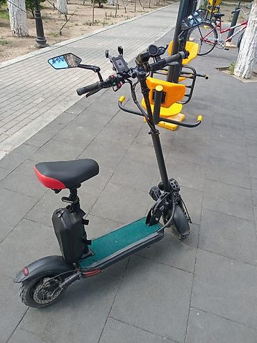 Elektrik skuter – oturacaqlı, güclü faralar və əlavə aksesuarlarla