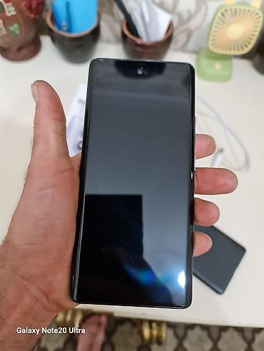 xiaomi 16 pro: Xiaomi 14 Pro, 256 GB, rəng - Qara, 
 Sensor, Barmaq izi, Simsiz şarj — 5