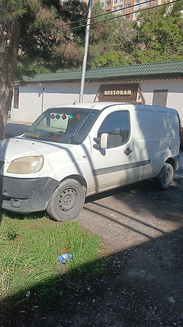 rol satisi: Fiat Doblo: 1.3 l | 2009 il Van body type — 4