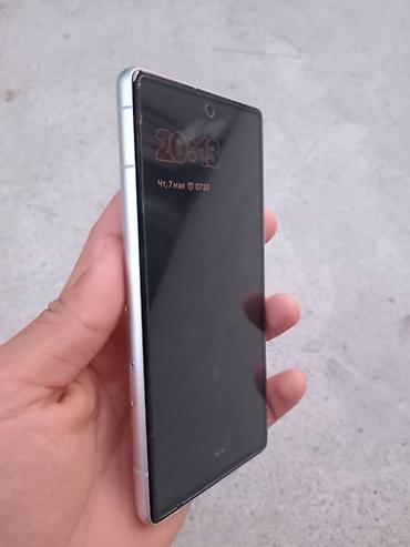 Google: Google Pixel 7a, Б/у, 128 ГБ, цвет - Белый, eSIM, 1 SIM — 9