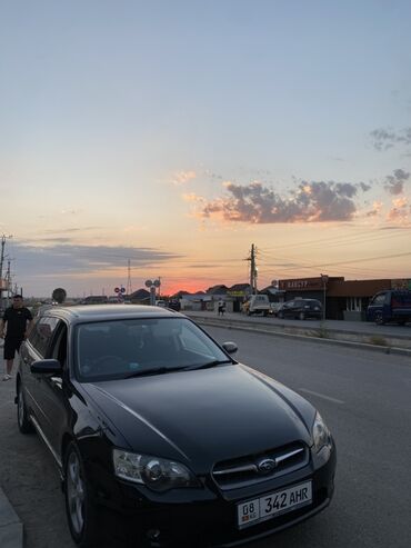 купить двигатель бмв х5 дизель: Элегантный универсал Subaru Legacy в черном цвете с обтекаемым