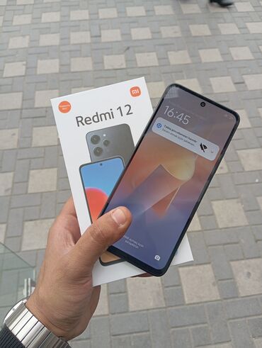 faizsiz kredit telefonlar: Xiaomi Redmi 12, 256 GB, rəng - Qara, 
 Barmaq izi, Face ID
