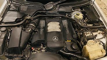 yan guzgulər s: Mercedes-Benz E-Class: 2.8 l | 1997 il Sedan — 7