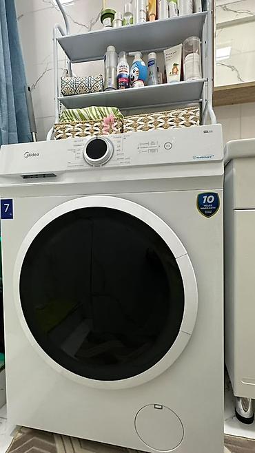 круглое стекло: Стиральная машина Midea (фронтальная загрузка) - Вместимость: 7 кг — 2