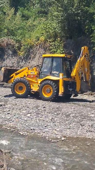 MST backhoe-loader (ekskavator-yükləyici) - Marka/model: MST (Auto