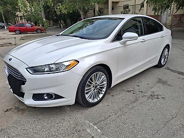 Ford: Ağ rəngdə Ford Fusion sedanı. Bu avtomobilin salonda rahat -da lalafo.az — 10 Ford: Ağ rəngdə Ford Fusion sedanı. Bu avtomobilin salonda rahat — 10
