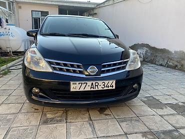 bmw e 39: Nissan Tiida, qara rəng, hetçbek gövdə. - Güclü və qənaətcil benzin — 2