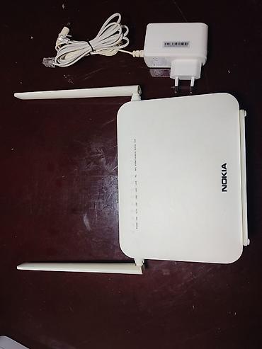 nokia gpon modem: Nokia G-1425G-B GPON ONT Wi‑Fi router Xüsusiyyətlər: - GPON ONT – — 1