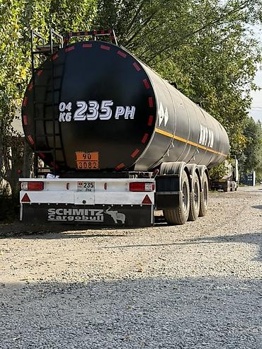 мата секыл: Полуприцеп-цистерна Schmitz Cargobull для перевозки опасных грузов. - — 1